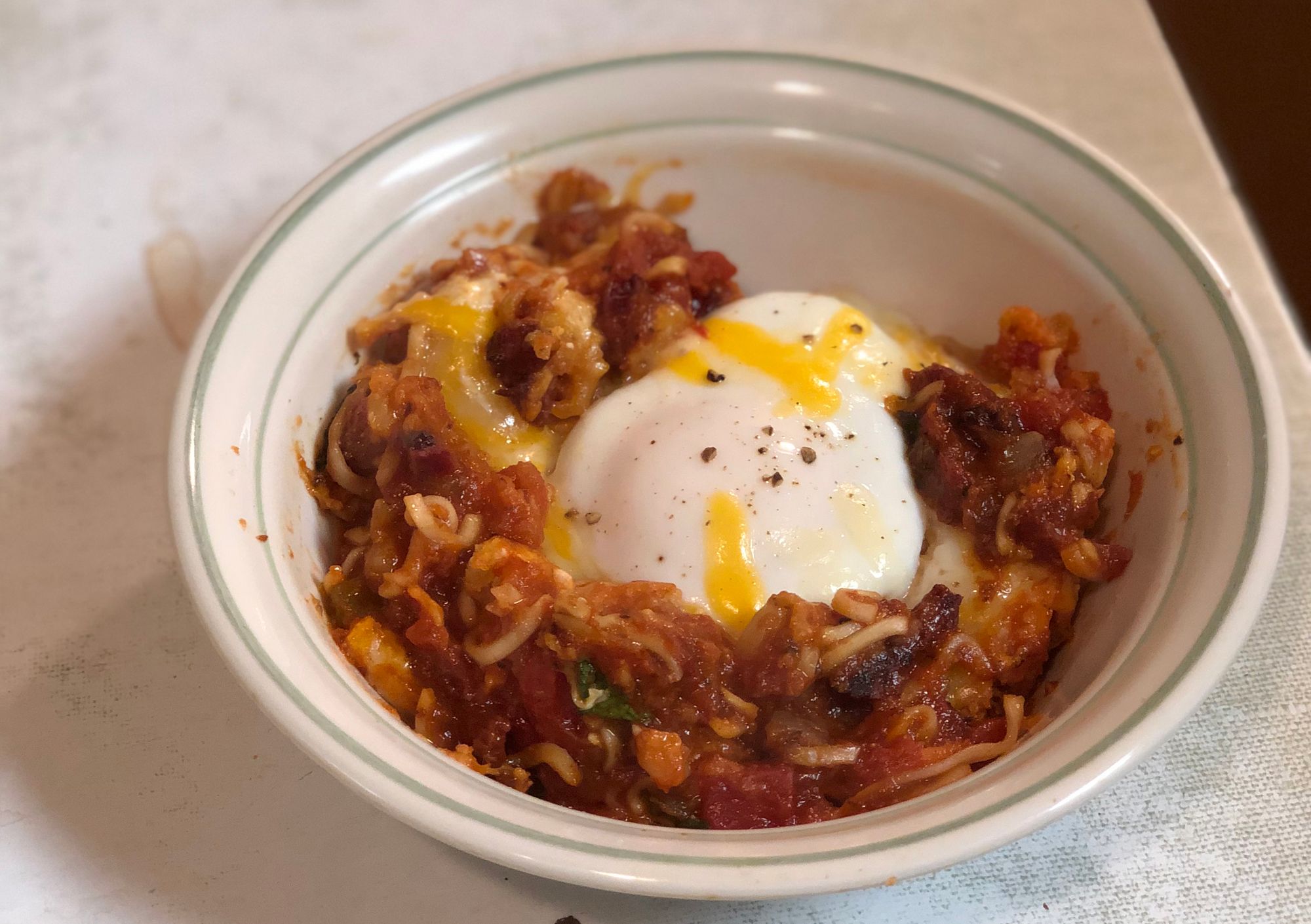 Making shakshuka with Cheez-Its and instant ramen